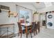 Dining room featuring hardwood floors, and large window at 5237 W 100Th Ct, Westminster, CO 80020