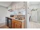 Efficient kitchen featuring stainless steel appliances, breakfast bar, and ample counter space at 5237 W 100Th Ct, Westminster, CO 80020