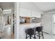 Open kitchen featuring eat in counter, stainless steel appliances, and modern finishes at 5237 W 100Th Ct, Westminster, CO 80020