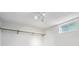 Basement storage area with rack system and a window at 8490 E Davies Pl, Centennial, CO 80112