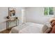Well-lit bedroom featuring a comfortable bed, stylish decor, and ample natural light at 8490 E Davies Pl, Centennial, CO 80112