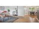 Bright living space with hardwood flooring, neutral walls, and stylish decor at 8490 E Davies Pl, Centennial, CO 80112
