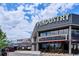 An eye-level photo of the Pindustry building. The sign advertises the world famous skydeck at 8490 E Davies Pl, Centennial, CO 80112