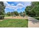 The community playground offers fun equipment, a soft ground covering, and shady trees nearby at 8490 E Davies Pl, Centennial, CO 80112