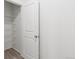 Bright closet featuring wire shelving with white walls and wood-look flooring at 13342 E 110Th Way, Commerce City, CO 80022