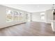 Bright and airy living room features large windows and a sliding door providing natural light at 13342 E 110Th Way, Commerce City, CO 80022