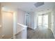 Second floor hallway featuring wood floors and natural paint color at 21854 E 9Th Pl, Aurora, CO 80018