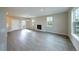 Spacious living room with wood floors, fireplace, and lots of natural light at 21854 E 9Th Pl, Aurora, CO 80018