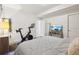 Cozy bedroom features neutral walls, modern exercise equipment, and a relaxing atmosphere for rest at 1511 S Pennsylvania St, Denver, CO 80210