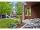 Inviting front porch with modern seating and lush landscaping, creating a welcoming entrance at 1511 S Pennsylvania St, Denver, CO 80210