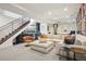 Entertain in this luxurious living room with a bar, wet bar and a comfortable seating area at 1511 S Pennsylvania St, Denver, CO 80210
