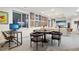 Living room includes a media center and a table and chairs set for entertaining at 1511 S Pennsylvania St, Denver, CO 80210