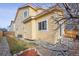 Exterior view of home highlighting the well-maintained lawn, landscaping, and private patio at 10121 Wyandott Cir, Thornton, CO 80260