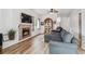 Comfortable living area with a fireplace, hardwood floors, and natural light, perfect for relaxing at 10121 Wyandott Cir, Thornton, CO 80260