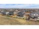 Aerial view showcasing the home's backyard, fencing, and neighborhood at 11741 Magnolia St, Thornton, CO 80233