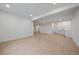 Large open basement with a wet bar, ideal for entertaining or a home office at 11741 Magnolia St, Thornton, CO 80233