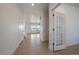 Bright entryway with wood-look flooring and a view into the living area at 11741 Magnolia St, Thornton, CO 80233