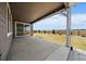 Covered patio overlooking the spacious, fenced backyard of the property at 11741 Magnolia St, Thornton, CO 80233