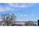 Picturesque lake view, featuring serene waters and cityscape backdrop, creating a tranquil setting at 5128 W 26Th Ave # 311, Denver, CO 80212