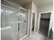 This bright bathroom features a glass shower and closet area for maximum space saving at 8428 Galvani Trl # D, Littleton, CO 80129
