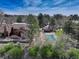 Aerial view showcases a community pool and well-maintained grounds at 2685 S Dayton Way # 145, Denver, CO 80231