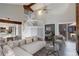 Open concept living area with high ceilings, a modern staircase, and outdoor access at 2685 S Dayton Way # 145, Denver, CO 80231