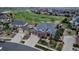 Beautiful aerial view of a home adjacent to a lush golf course with mature trees at 27319 E Nova Cir, Aurora, CO 80016