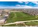 Stunning aerial view of the property with golf course and neighborhood in the background at 27319 E Nova Cir, Aurora, CO 80016