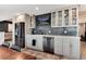 Basement kitchenette with modern cabinets and appliances at 27319 E Nova Cir, Aurora, CO 80016