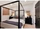 Elegant bedroom with four-poster bed and window at 27319 E Nova Cir, Aurora, CO 80016