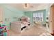Charming bedroom with built-in bed and hanging chair at 27319 E Nova Cir, Aurora, CO 80016