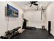 In-home gym with a treadmill and weight bench at 27319 E Nova Cir, Aurora, CO 80016