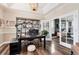 Spacious home office with a large desk and built-in shelving at 27319 E Nova Cir, Aurora, CO 80016