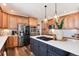 Modern kitchen with stainless steel appliances and ample cabinetry at 27319 E Nova Cir, Aurora, CO 80016