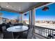 Cozy covered patio with comfortable seating, barbecue, and beautiful views at 27319 E Nova Cir, Aurora, CO 80016