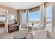 Bright sitting area with window seat, offering stunning views at 27319 E Nova Cir, Aurora, CO 80016