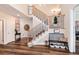 Elegant staircase with wrought iron railing and wooden steps at 27319 E Nova Cir, Aurora, CO 80016