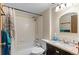 Bathroom with shower-tub combo, toilet, sink, and granite vanity at 3977 S Pitkin Way, Aurora, CO 80013