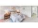 Serene main bedroom with soft lighting, comfortable bedding, and calming decor at 5735 W Atlantic Pl # 101, Lakewood, CO 80227