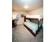 bedroom featuring a bunk bed with gray carpet flooring and bright window at 359 Courtfield Way, Castle Pines, CO 80108