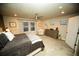 Bright bedroom with neutral carpet, windows, and gray accents at 359 Courtfield Way, Castle Pines, CO 80108