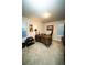 Office with neutral colored walls, a large desk and plush carpet for comfortable work environment at 359 Courtfield Way, Castle Pines, CO 80108