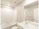 Bathroom with bathtub, toilet, and single vanity at 229 Mayfly Ln, Berthoud, CO 80513