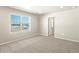 Well lit bedroom with carpet and window at 229 Mayfly Ln, Berthoud, CO 80513