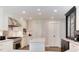 Bright kitchen with stainless steel appliances, white cabinets, and ample counter space at 8004 S Oneida Ct, Centennial, CO 80112
