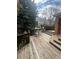 Relaxing wooden deck features multiple levels, scenic views and serene outdoor space at 13781 E Lehigh Ave # E, Aurora, CO 80014