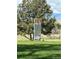 Fourteenth hole on a golf course with a view of mountains in the distance at 13781 E Lehigh Ave # E, Aurora, CO 80014
