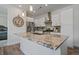 Modern kitchen featuring stainless steel appliances, granite countertops, and pendant lighting at 31191 Black Eagle Dr # 304, Evergreen, CO 80439