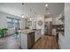 Bright and modern kitchen with stainless steel appliances, granite countertops, and eat-in dining at 31191 Black Eagle Dr # 304, Evergreen, CO 80439