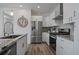 Stylish kitchen with stainless steel appliances, granite countertops, and ample storage space at 31191 Black Eagle Dr # 304, Evergreen, CO 80439